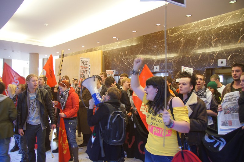 Students getting inside the Millbank building. Photo: Geoff Dexter