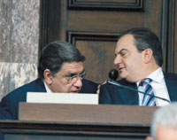 The prime minister Karamanlis (right) and the minister of labour