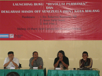 The banners read: The Launch of Permanent Revolution and Hands Off Venezuela in Malang