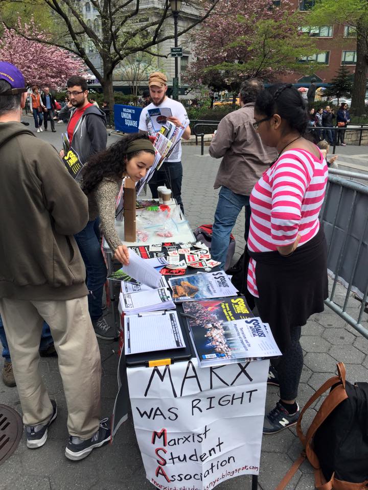 Socialist Revolution comrades selling materials in NYC Image own work