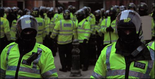 The police are preparing to face the anger of the workers that the economic crisis has unleashed. Photo by Rich Lewis.